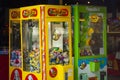 Two claw Crane Maschines. Classic claw grabber game machines filled with toys.