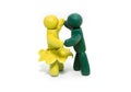 Two clay figures dancing Royalty Free Stock Photo