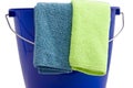 Two Cleaning microfiber cloths a blue bucket Royalty Free Stock Photo