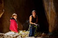 Two climbers in a cave Royalty Free Stock Photo