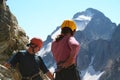 Two climbers looking down