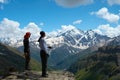 Two climbers looking at the mountains Royalty Free Stock Photo