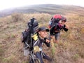 two climbers take pictures to capture the moment in the meadows of Mount MT. Rinjani, Lombok, Indonesia
