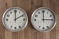 Two clocks, one showing two o\'clock, the other showing three o\'clock. Royalty Free Stock Photo