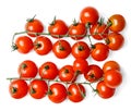 Two clusters of fresh cherry tomatoes. White isolated background. View from above. Royalty Free Stock Photo