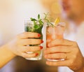 Two cocktail glasses in man and woman hand Royalty Free Stock Photo