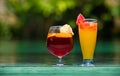 Two cocktail glasses by the pool Royalty Free Stock Photo