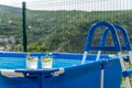 Two cocktails on a portable swimming pool