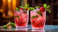 two cocktails with strawberries and mint on a table Royalty Free Stock Photo