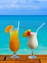 Two cocktails on table at beach cafe Royalty Free Stock Photo