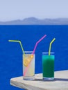 Two cocktails on table at beach Royalty Free Stock Photo