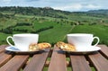 Two coffee cups and cantuccini on the wooden table Royalty Free Stock Photo