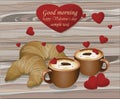Two coffee cups and croissants on wood background. Romantic breakfast love. Valentines Day card