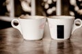 Two coffee cups with red hearts Royalty Free Stock Photo