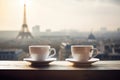 two coffee cups on table against Paris city skyline Eifel tower roof top panorama view concept of visiting Paris Royalty Free Stock Photo