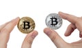 two coins of bitcoin in the hands of a man Royalty Free Stock Photo