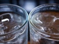 Two cold water glass with ice cubes, Water drops, Close up & Macro shot, Selective focus, Healthy Drink concept Royalty Free Stock Photo