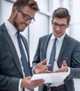 Two colleagues looking at the digital tablet screen Royalty Free Stock Photo