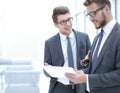 Two colleagues looking at the digital tablet screen Royalty Free Stock Photo