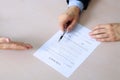 Two colleagues is signing a contract, business meeting in the office Royalty Free Stock Photo