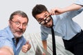 Two colleagues taking the picture to them self sitting in office Royalty Free Stock Photo