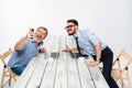 Two colleagues taking the picture to them self sitting in office Royalty Free Stock Photo