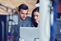 Young Casual business couple using computer in the office. Coworking, Creative manager showing new startup idea Royalty Free Stock Photo