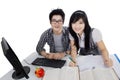 Two college student learn on table Royalty Free Stock Photo
