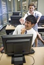 Two college students hanging out in library Royalty Free Stock Photo