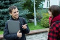 Two college students talking and flirting Royalty Free Stock Photo