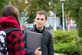 Two college students talking and flirting Royalty Free Stock Photo