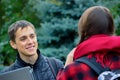 Two college students talking and flirting Royalty Free Stock Photo