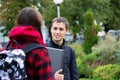 Two college students talking and flirting Royalty Free Stock Photo