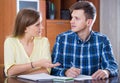 Two collegues working with documents together in office Royalty Free Stock Photo