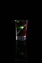 Two color double alcoholic short drink isolated on black background Royalty Free Stock Photo