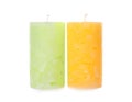 Two color wax candles on white Royalty Free Stock Photo