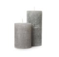 Two color wax candles on white Royalty Free Stock Photo