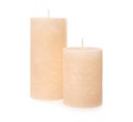 Two color wax candles on white Royalty Free Stock Photo