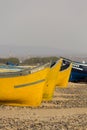 Two Colored fishing boats on the beach of Sidi Kaouki Royalty Free Stock Photo