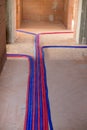 Two colored pipes on the floor