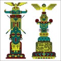 Two colored totem poles Royalty Free Stock Photo