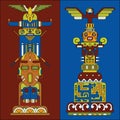 Two colored totem poles Royalty Free Stock Photo