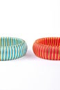 Two colorful bangles on white background. Royalty Free Stock Photo