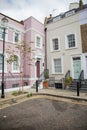 Two colorful British houses at a street corner Royalty Free Stock Photo