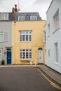 Two colorful British houses at a street corner Royalty Free Stock Photo