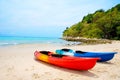 Two colorful canoe on sandy beach Royalty Free Stock Photo
