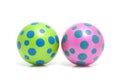 Two colorful dotted balls