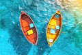 Two Colorful Fishing Boats Floating on Turquoise Water Ocean Top View Royalty Free Stock Photo