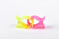 Two colorful hair clips on white background. Royalty Free Stock Photo
