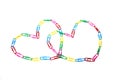 Two colorful hearts from paperclips on the white Royalty Free Stock Photo